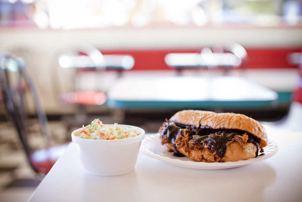 Pulled pork sandwich with a side of coleslaw